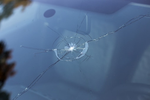 Sandblasted Windshield - Smashed windscreen of a car, damaged glass